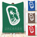 Green rock climbing blanket featuring a climber, rope, carabiner, mountain artwork, and custom design