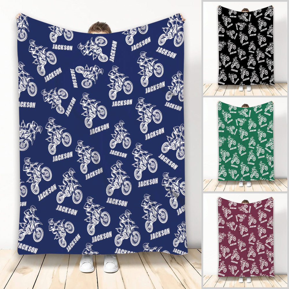Custom motocross blanket featuring repeated dirt bike rider artwork in multiple color options
