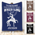 Wrestling throw blanket featuring a dramatic grappling silhouette, bold varsity lettering, and multiple color options