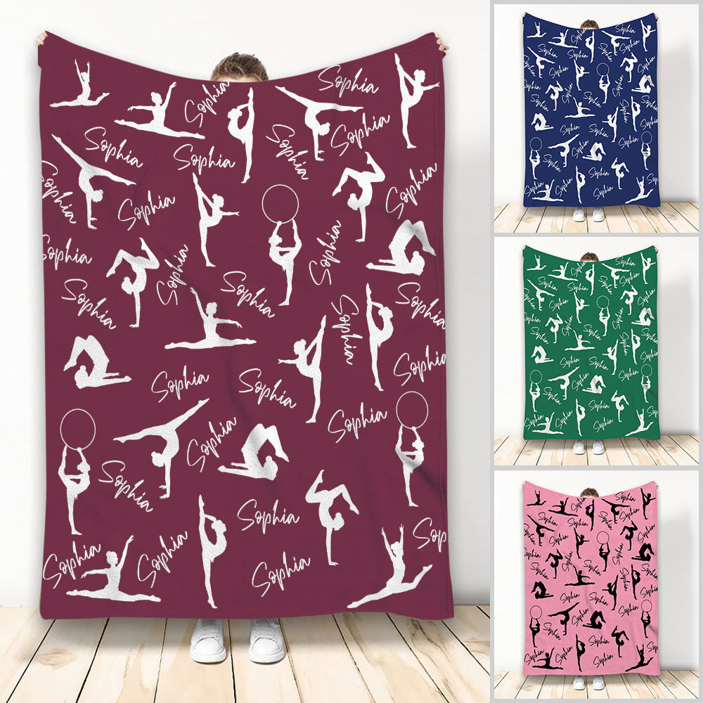 Gymnastics throw blanket with white gymnast silhouettes on a maroon background