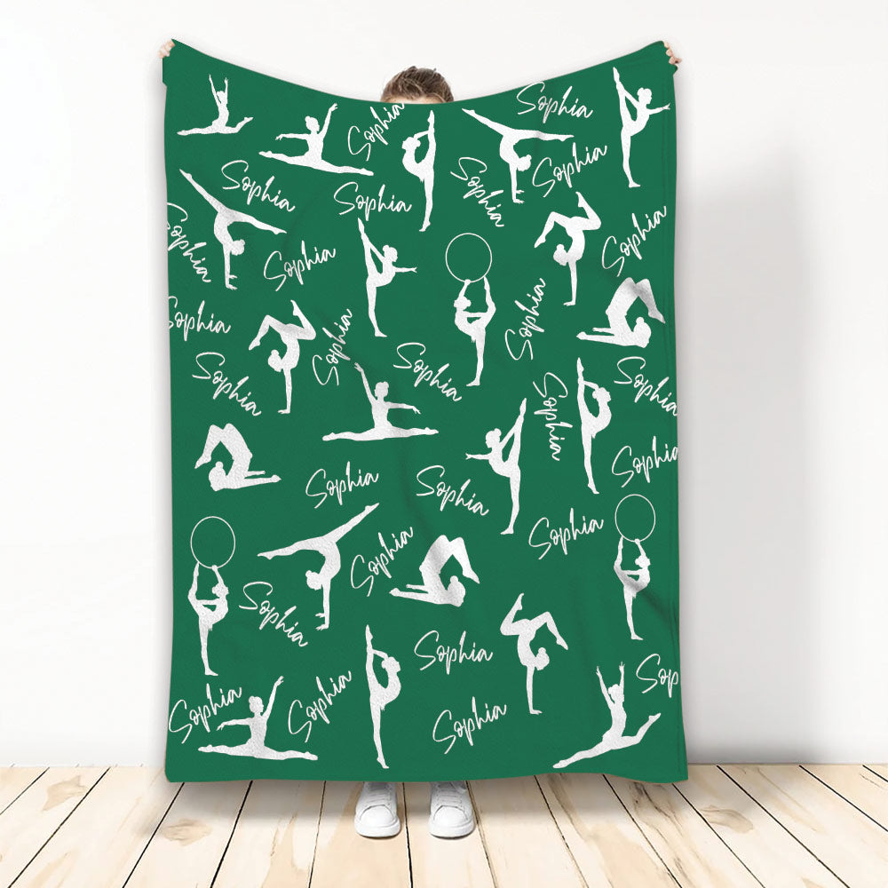 Green gymnastics blanket featuring an all-over pattern of white gymnast silhouettes