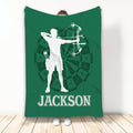 Green archery throw blanket featuring an archer silhouette, bow, arrows, and target artwork