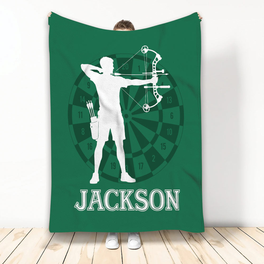 Green archery throw blanket featuring an archer silhouette, bow, arrows, and target artwork