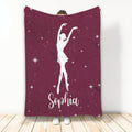 Burgundy ballet throw blanket displayed with a graceful dancer silhouette and sparkling star design