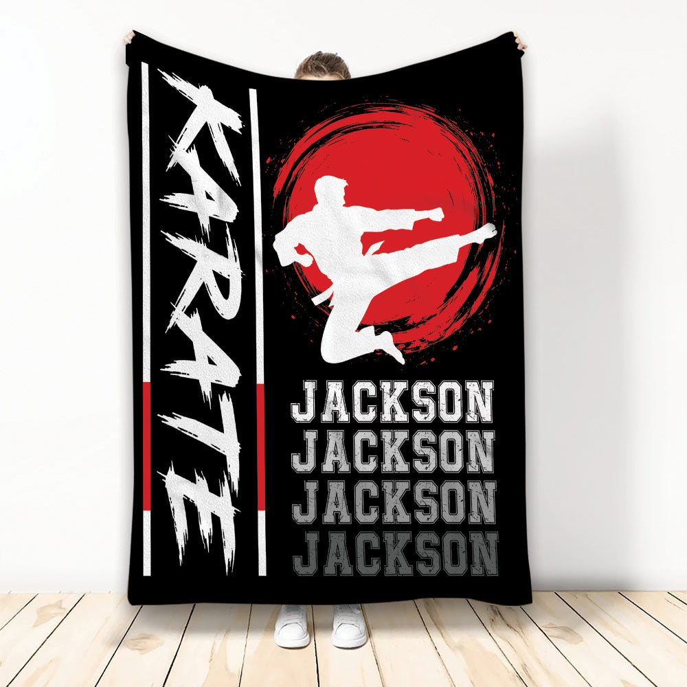 Black karate blanket with white martial artist kicking silhouette and bold red circular background