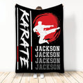 Black karate blanket with white martial artist kicking silhouette and bold red circular background