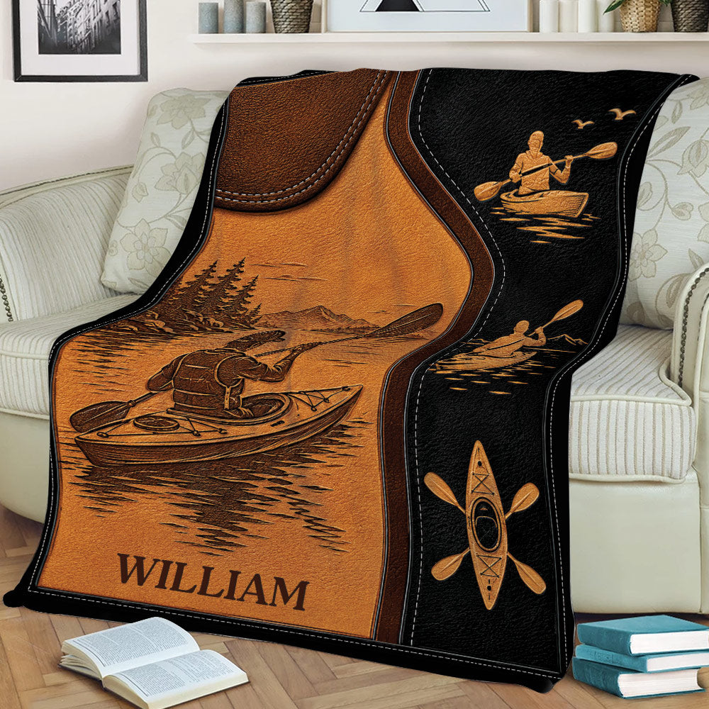 Kayaking throw blanket displayed on a couch with vintage paddling artwork, water scenery, and kayak illustrations