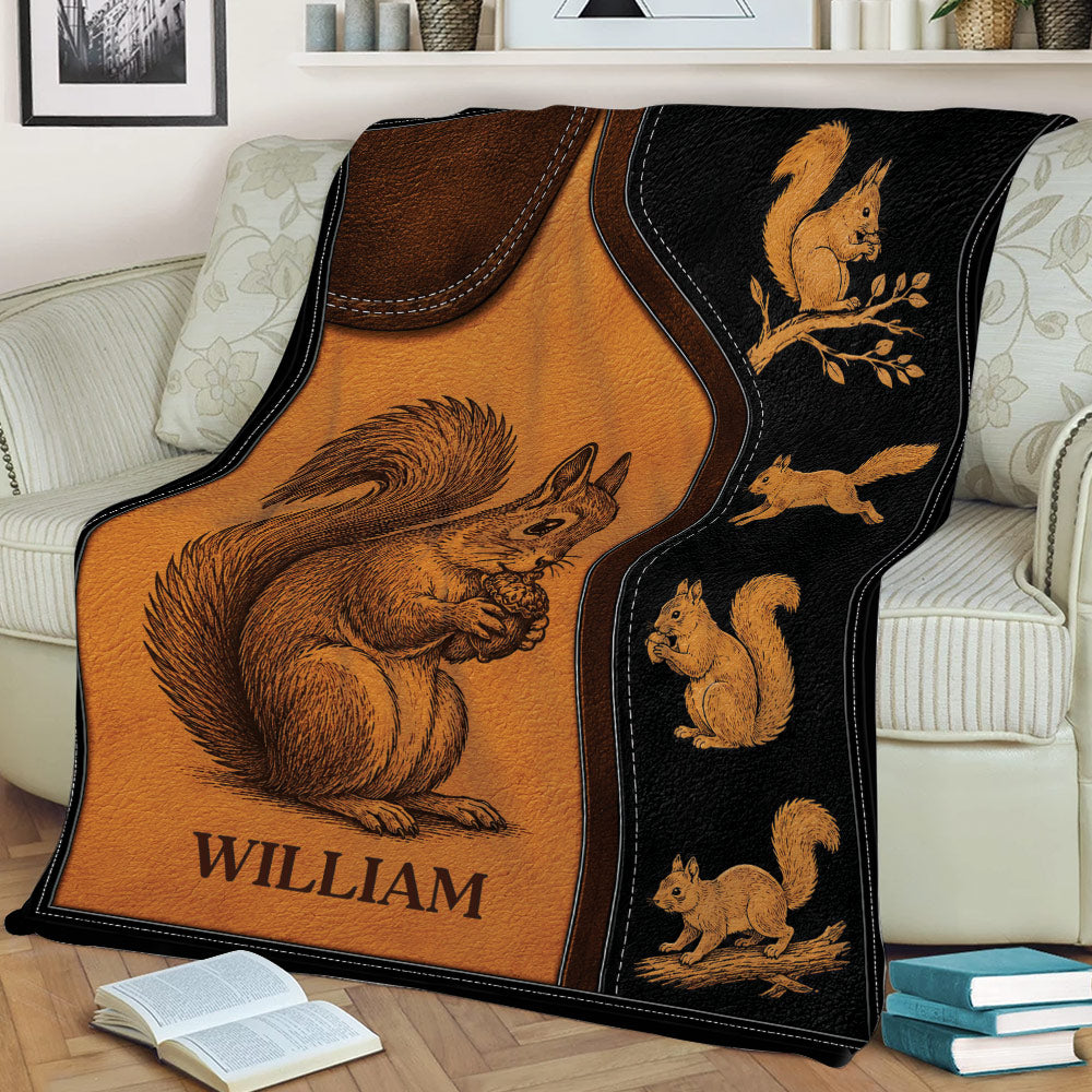 Squirrel blanket spread across a couch, featuring illustrated squirrels and a rustic brown and black design