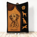 Dalmatian throw blanket with spotted dog portrait, paw print, dog silhouettes, and warm black and tan artwork