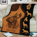 Cane Corso dog portrait throw blanket displayed across a sofa in a warm brown and black design