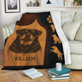 Rottweiler blanket draped over a sofa with rustic dog artwork and paw print design