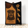 Rottweiler throw blanket with rustic brown and black artwork, paw print, and dog silhouettes