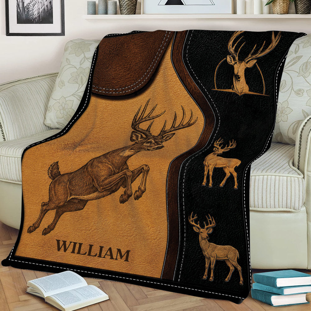Custom deer blanket displayed on a sofa with vintage-style buck illustrations and rustic artwork