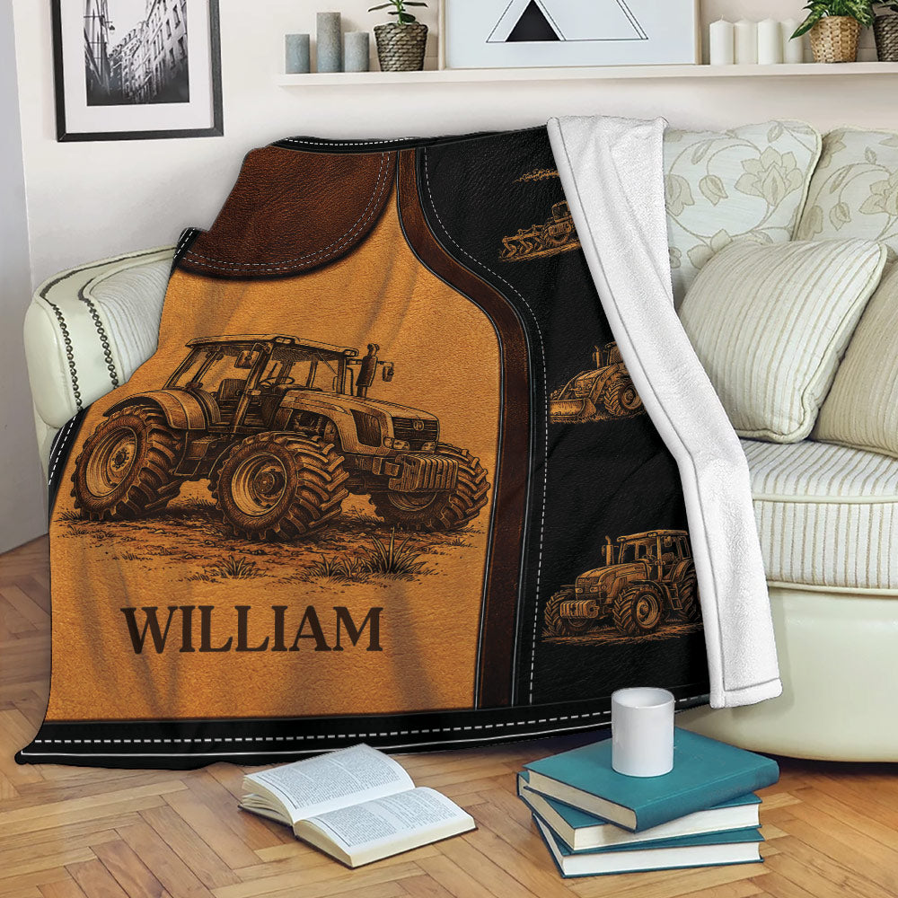 Rustic tractor throw blanket draped over a sofa with vintage farm machinery artwork