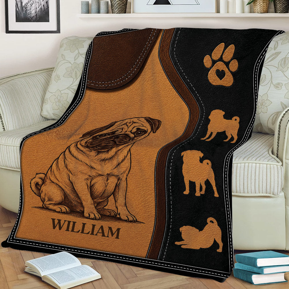 Custom Pug throw blanket draped over a sofa with paw print and multiple pug silhouettes