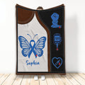 Diabetes awareness throw blanket with blue ribbon, butterfly artwork, glucose meter, and medical symbols