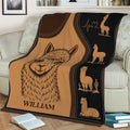 Alpaca blanket displayed on a couch with a large illustrated alpaca portrait and rustic western theme
