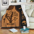 Arborist blanket draped over a sofa, showing tree climbing gear and woodland-inspired artwork