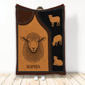 Rustic sheep throw blanket with a large illustrated sheep and smaller sheep artwork in brown and black