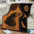 Rustic Labrador Retriever blanket displayed on a couch with a realistic dog illustration and paw emblem