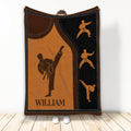 Karate throw blanket featuring dynamic martial arts silhouettes in bold orange, brown, and black artwork