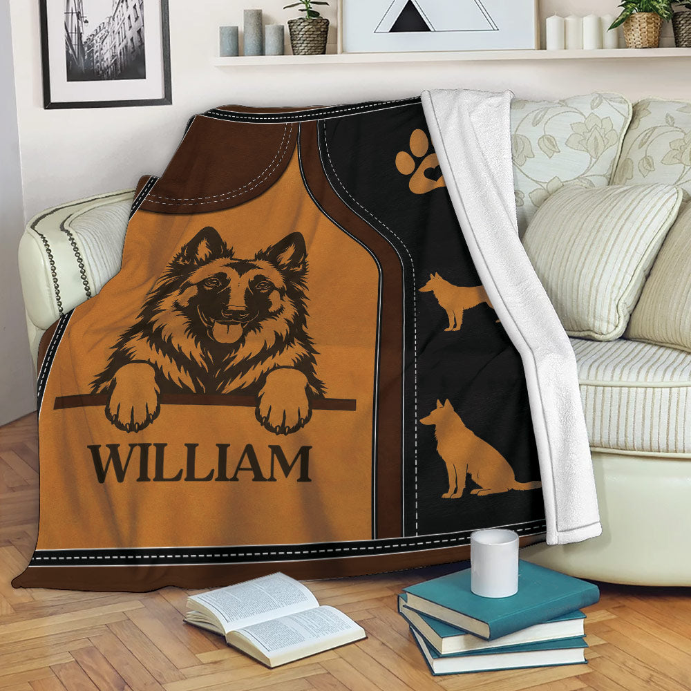 Belgian Shepherd blanket displayed on a sofa with warm brown and black dog-themed artwork