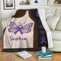 Alzheimer's awareness throw blanket displayed on a sofa with purple ribbon and butterfly artwork