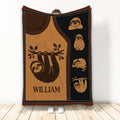 Brown and black sloth throw blanket featuring playful sloths hanging from branches