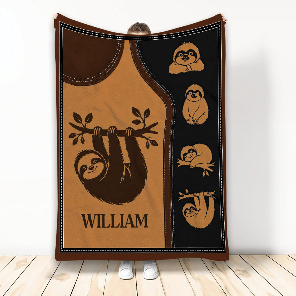 Brown and black sloth throw blanket featuring playful sloths hanging from branches