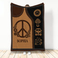 Hippie throw blanket with peace sign, flowers, retro van, mushroom, smiley sun, and earthy brown artwork