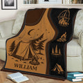 Rustic camping blanket draped over a sofa with outdoor adventure artwork and illustrated campsite scene