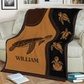 Sea turtle throw blanket draped over a sofa with illustrated turtles in a cozy living room