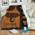 Elephant blanket draped over a sofa with warm earthy artwork and repeated elephant silhouettes