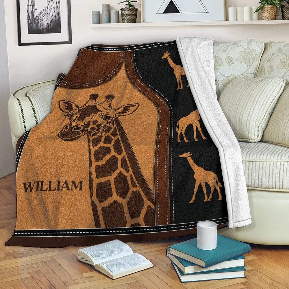 Rustic giraffe blanket draped over a sofa with warm brown artwork and black accents