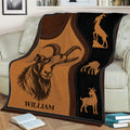 Rustic goat blanket draped over a couch with detailed farm animal artwork