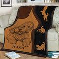 Close view of a Labradoodle throw blanket draped over a couch with illustrated dog motifs