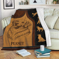 Golden Retriever throw blanket draped over a sofa with warm brown artwork and cozy reading room decor