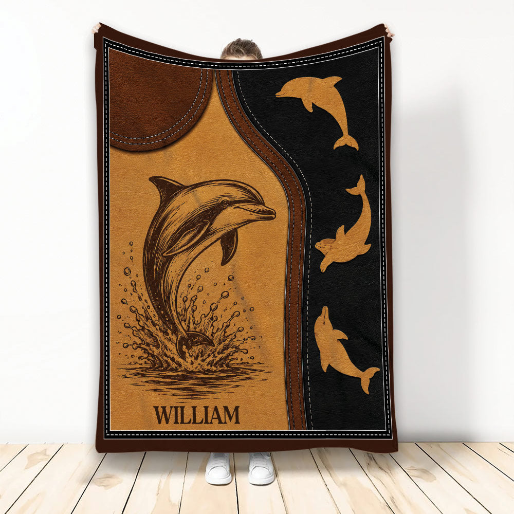Dolphin throw blanket featuring a leaping dolphin, ocean artwork, and a rustic brown and black design