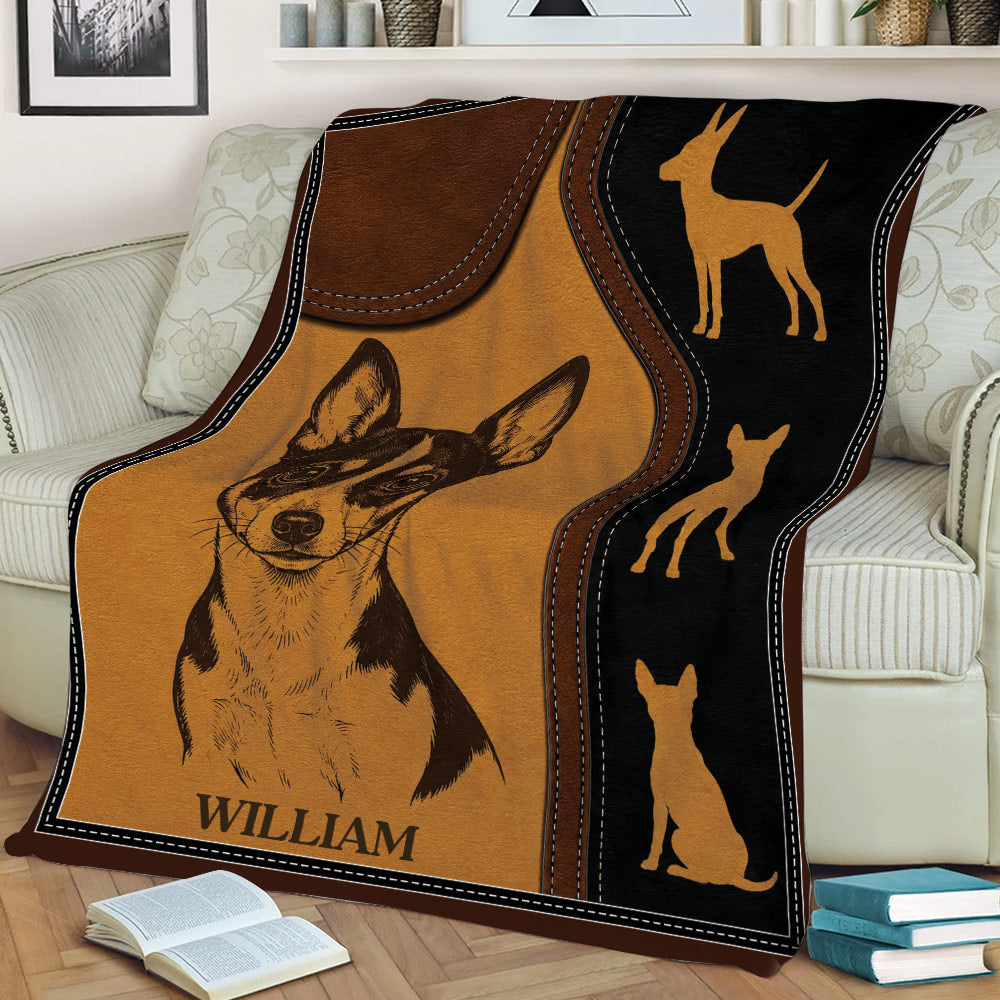 Custom Rat Terrier throw blanket draped over a couch with leather-look artwork and coordinating dog silhouettes