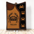 Crab throw blanket displayed upright with vintage brown and black coastal artwork