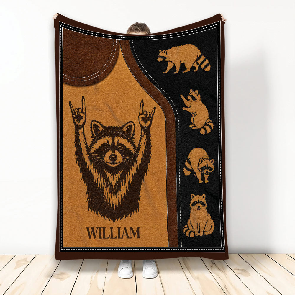 Raccoon throw blanket displayed upright with woodland artwork in warm brown and black tones