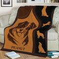 Australian Shepherd throw blanket draped over a sofa with illustrated dog artwork in brown and black