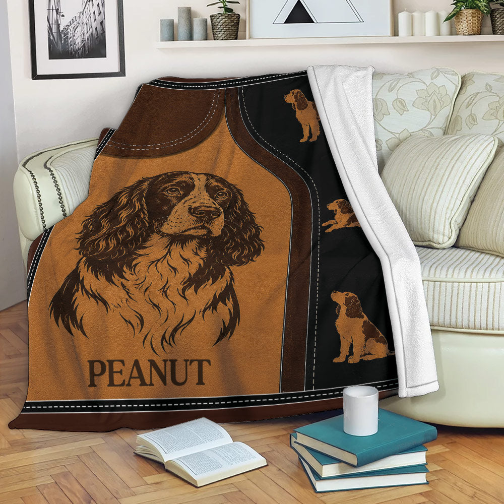 English Springer Spaniel blanket draped over a sofa with vintage brown and black dog artwork