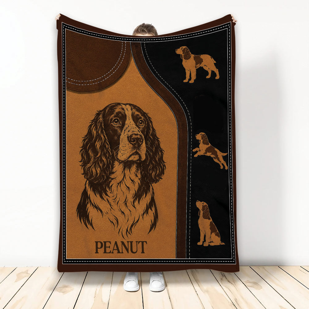 English Springer Spaniel throw blanket with brown and black dog artwork and smaller spaniel silhouettes