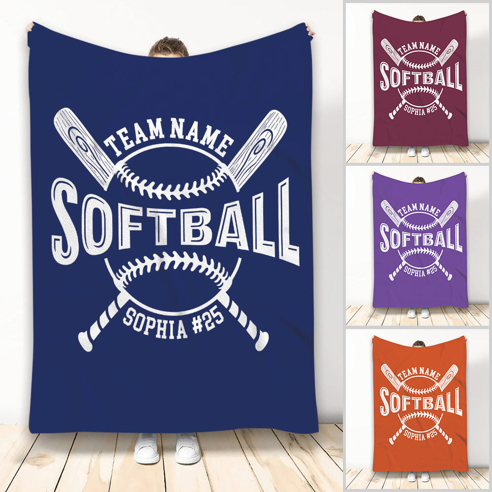 Navy softball throw blanket displayed with crossed bats, softball artwork, and bold white sports typography