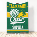 Green cheerleading throw blanket featuring white pom-poms, a megaphone, and gold stripe accents