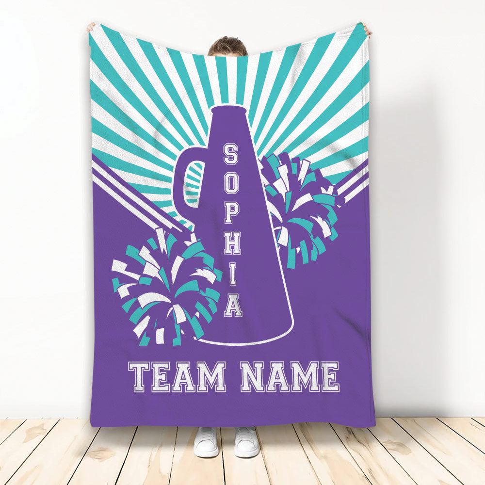 Purple and teal cheerleading blanket featuring a megaphone, pom poms, and bold radiating stripes