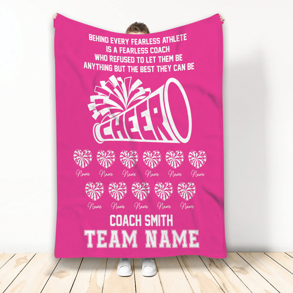 Pink cheerleading blanket featuring a bold megaphone graphic, pom-poms, and coach team artwork