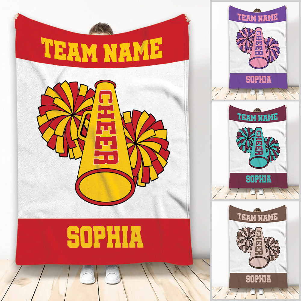 Cheerleading throw blanket featuring pom poms and a megaphone in bold team colors