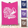 Cheerleading throw blanket with white pom-pom and megaphone artwork in pink, navy, purple, and brown